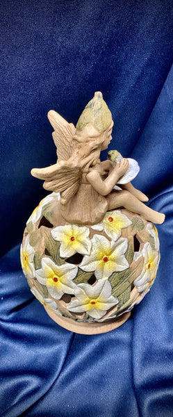 Musical Ceramic “Fairy on a Flower Bed” Statue